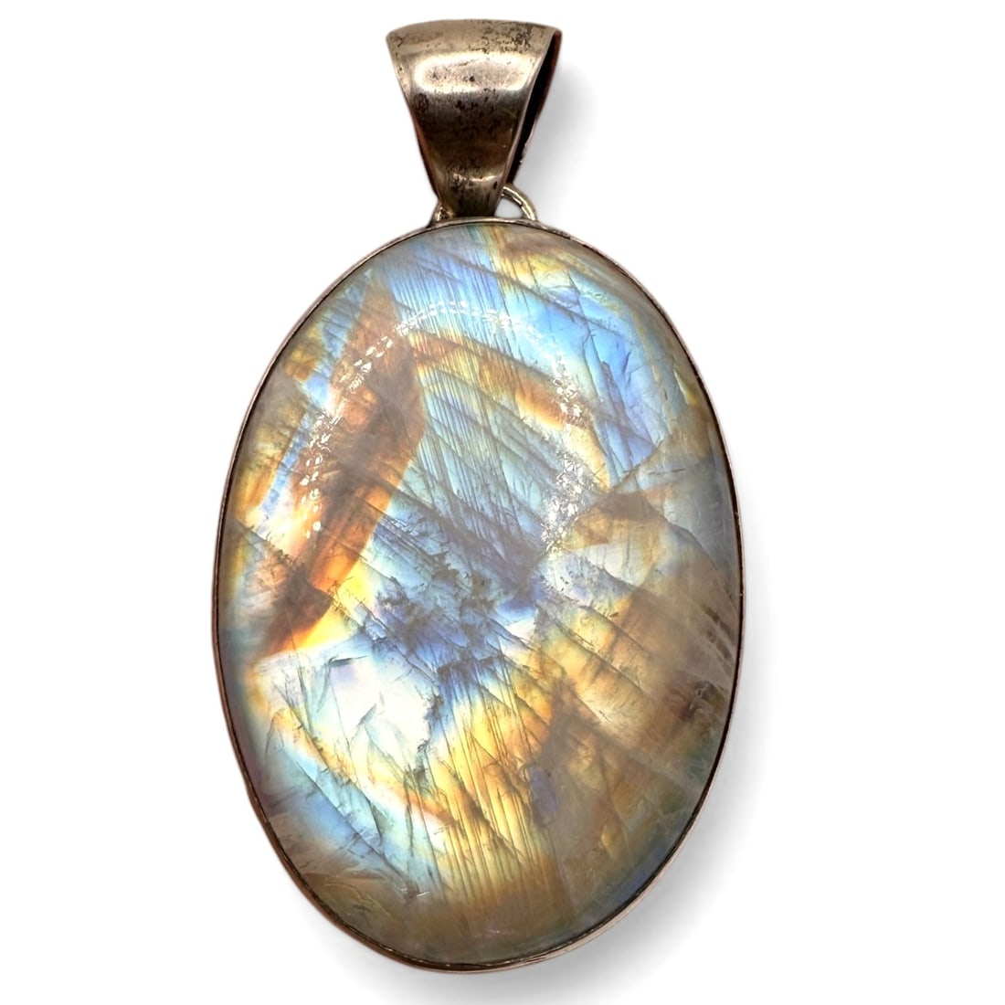 Large Oval Moonstone Pendant: In a sterling silver mounting. Measures 2 1/4" tall by 1 1/4" wide. Refer to photos for additional condition information as they are a part of the description. Please note lots may show signs of wear 
