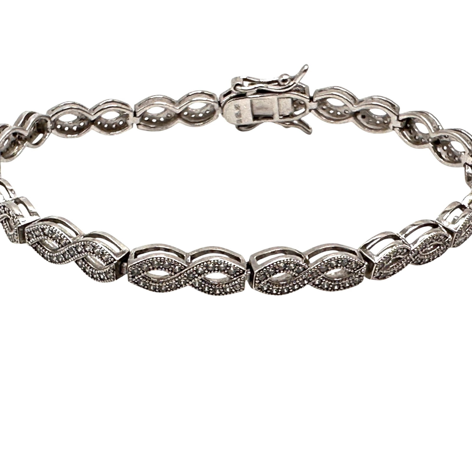 Sterling Silver and CZ Tennis Bracelet: Measures 7 1/4" long. Refer to photos for additional condition information as they are a part of the description. Please note lots may show signs of wear commensurate with age and use, and the lack of