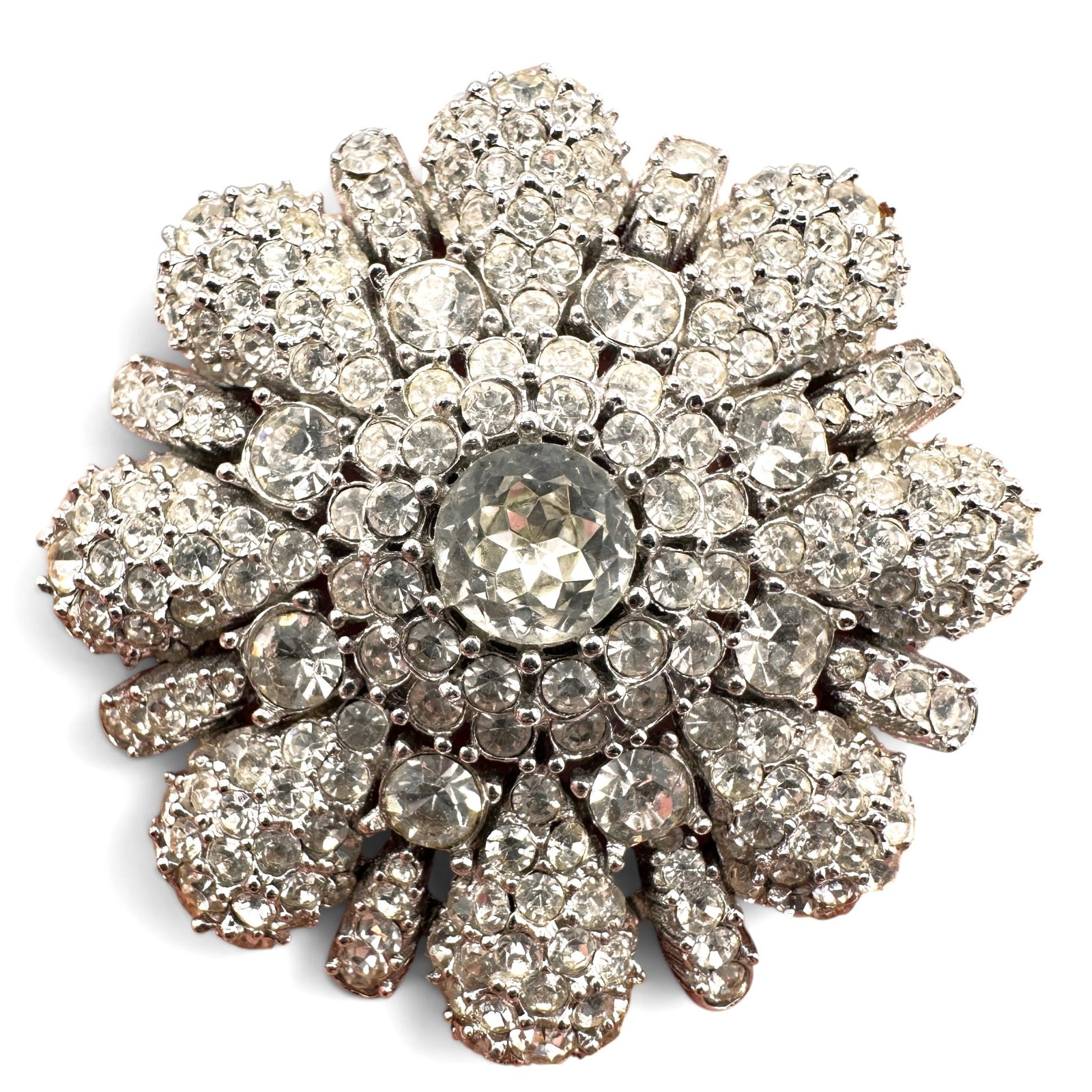 Vintage Ciner Rhinestone Brooch in Excellent Condition: Measures 1 3/4" in diameter. Refer to photos for additional condition information as they are a part of the description. Please note lots may show signs of wear commensurate with age and use, and the 