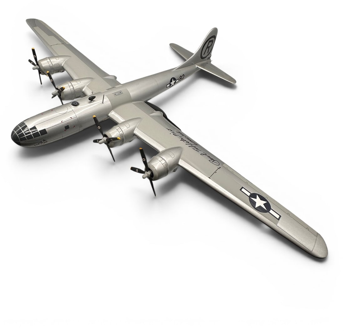 B-29 Super Fortress Enola Gay Signed Model Airplane: In very good condition. Signed by Paul Tibbets. Measures15" long x 23" wide. Refer to photos for additional condition information as they are a part of the description. Please note lots may show signs