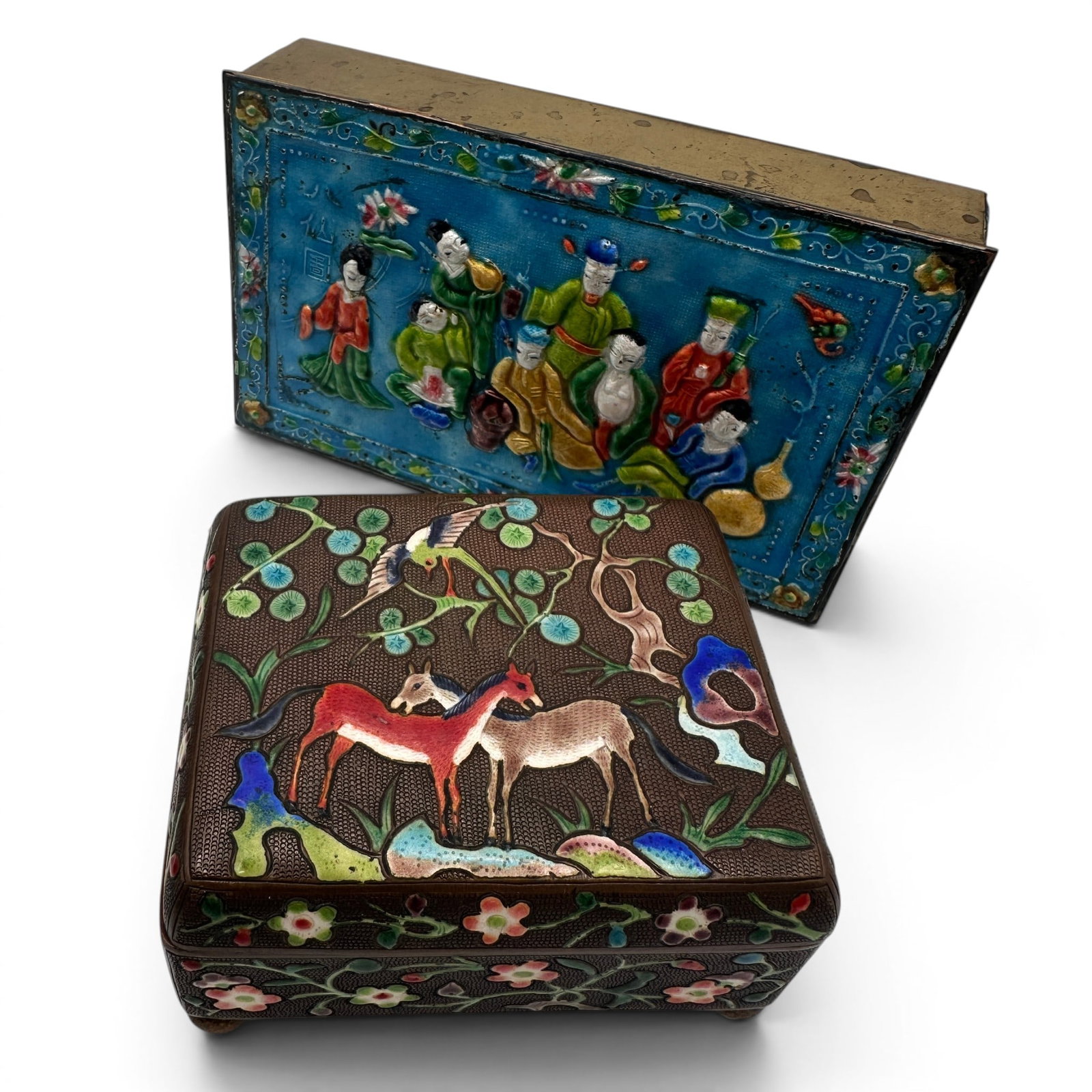 A Pair of Vintage Chinese Cloisonne Enamel Decorative Boxes: Copper box with deer measures 3 1/2" long x 3" wide x 2" high. Blue enamel box measures 6" long x 3 3/4" wide x 1 1/4" tall. Refer to photos for additional condition information as they are a part of 