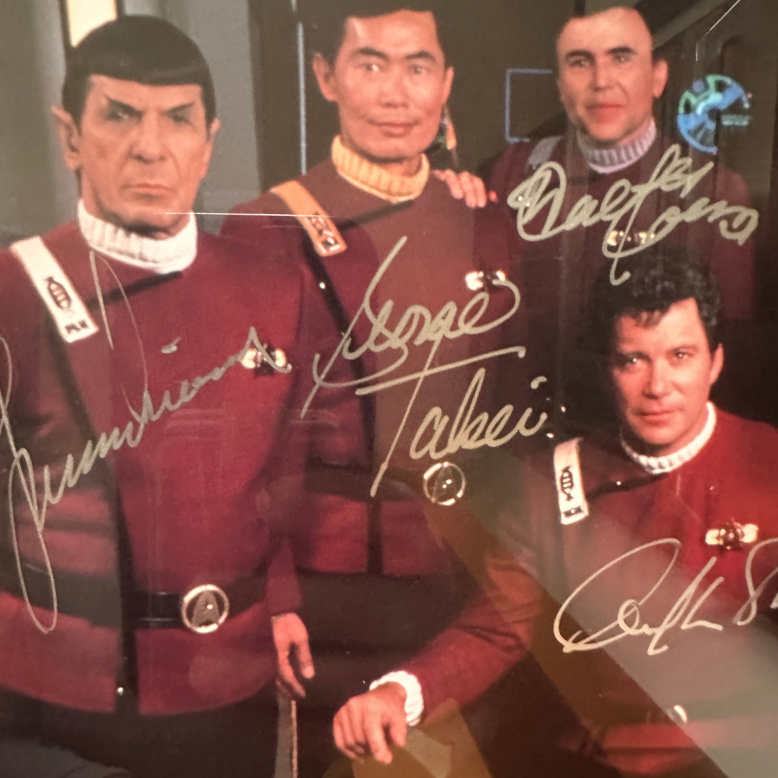 Star Trek Ltd Edition Autographed Photo of All 7 Crew Members: COA on back of piece. Numbered 2068/2500. Measures 20" square. Refer to photos for additional condition information as they are a part of the description. Please note lots may show signs of wear