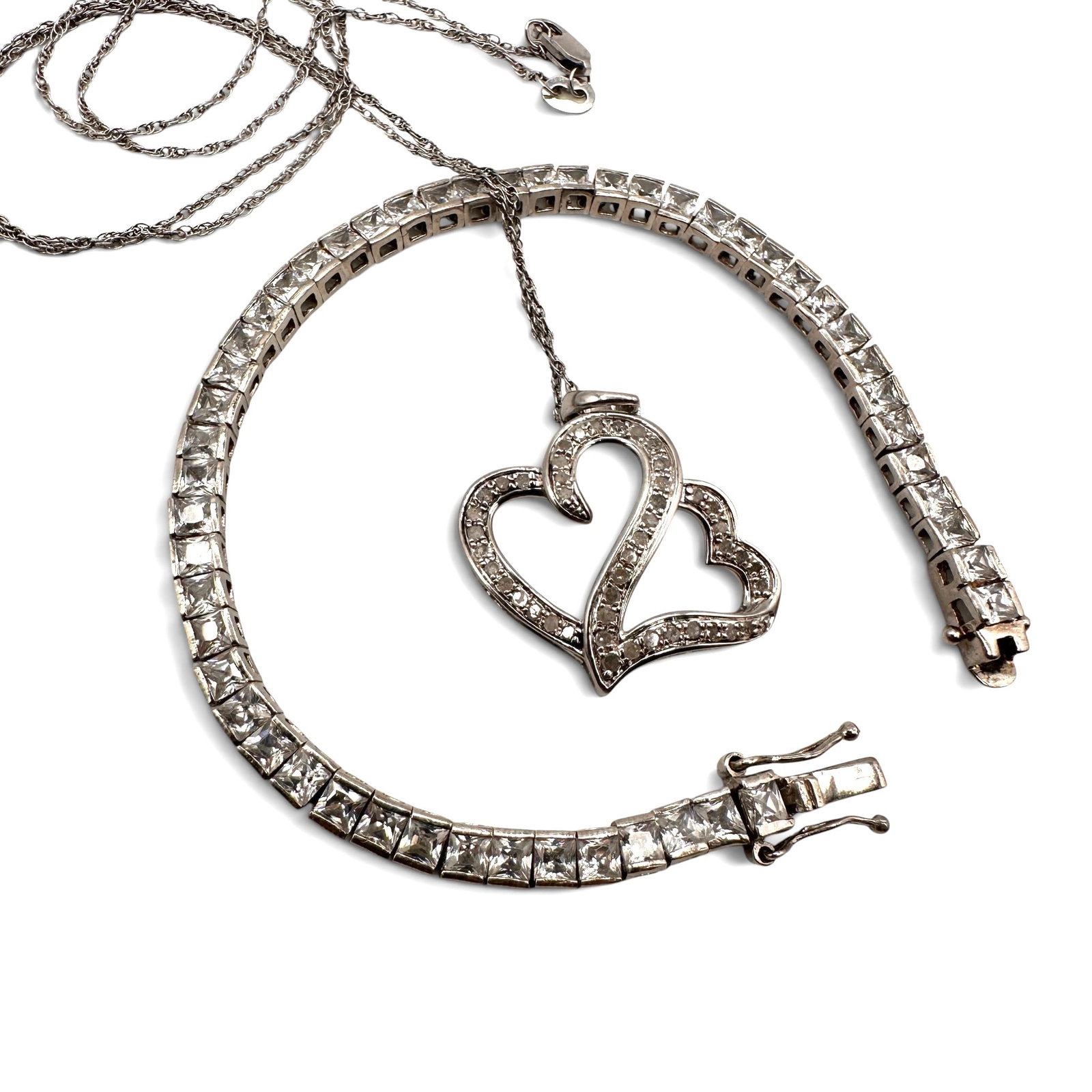 Natural Diamond Double Heart Necklace with CZ Tennis Bracelet in Sterling Silver: Necklace measures 20" in length. Bracelet measures 7 inches in length. Item is being sold as found from an estate collection and may show signs of age, use, wear, imperfections, or surface variations 