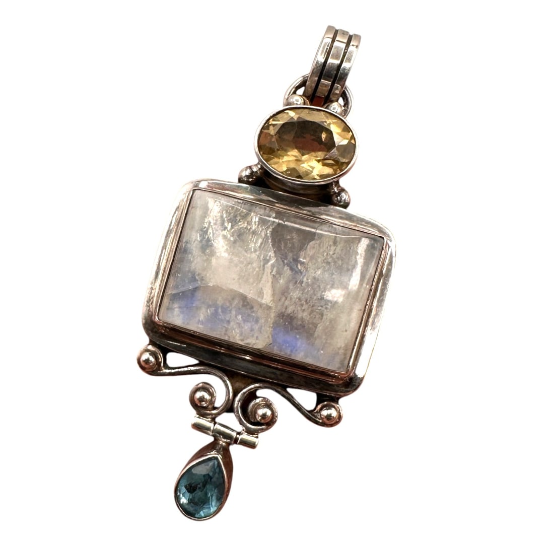 Sterling Silver Moonstone and Topaz Pendant: Elegant artisan-crafted sterling silver pendant featuring a striking combination of natural gemstones in a sophisticated vertical arrangement. The centerpiece is a substantial rectangular rainbow moon