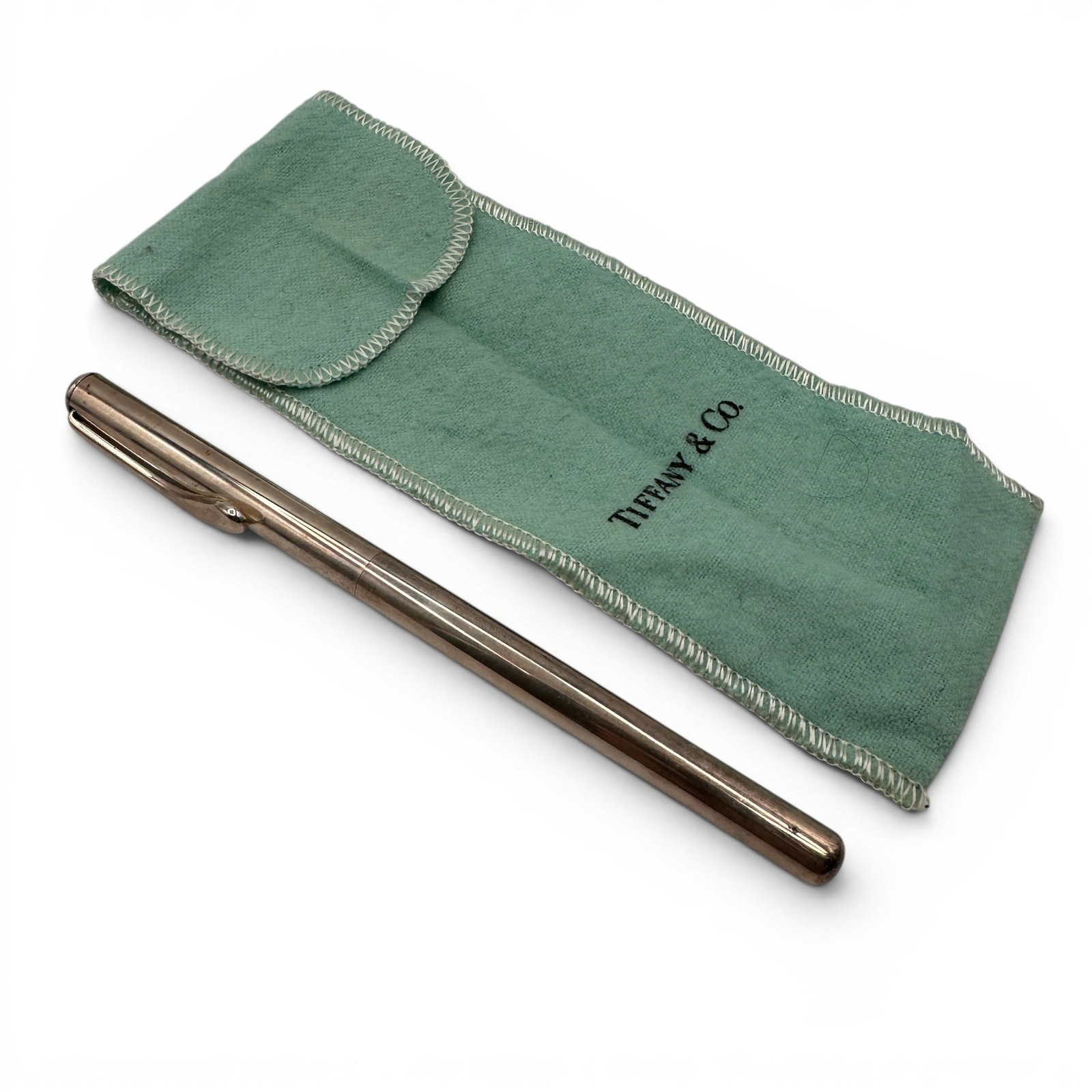 Elsa Peretti for Tiffany & Co. Sterling Silver Ballpoint Pen: Pen is in need of a cartridge. An elegant example of modern luxury design, this Elsa Peretti for Tiffany & Co. sterling silver ballpoint pen embodies the celebrated designer's signature minimalist aes