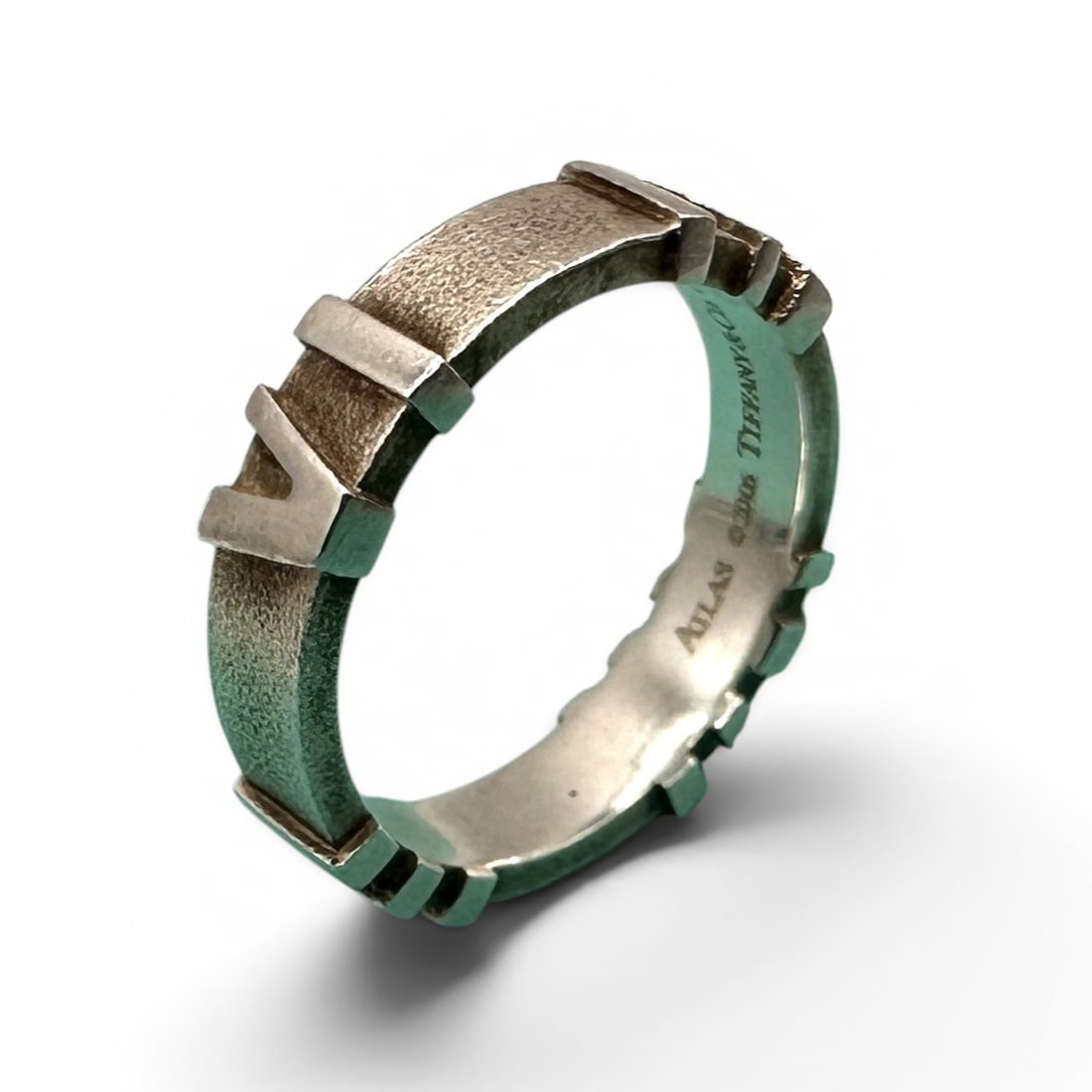 Tiffany & Co. Atlas Special Edition 2006 Sterling Silver Ring: Approximately a size 5. Celebrate an iconic Tiffany design with this Tiffany & Co. Atlas Special Edition 2006 sterling silver ring, showcasing the collection's signature architectural aesthetic. Craft