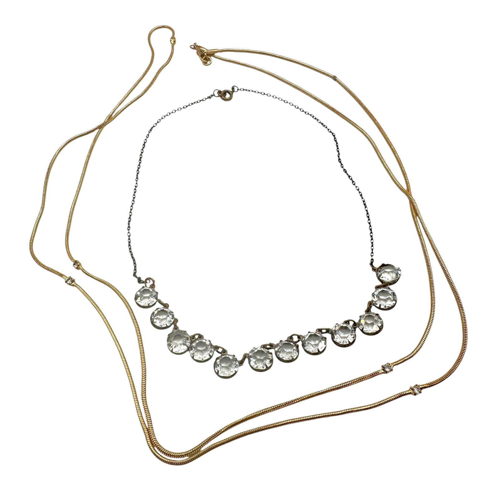 Pair of Vintage Costume Jewelry Rhinestone Necklaces: Gold tone chain measures 40" in length. Silver tone necklace measures 14" in length. Please review photos for more details as they are a part of the description. Item is being sold as found from an