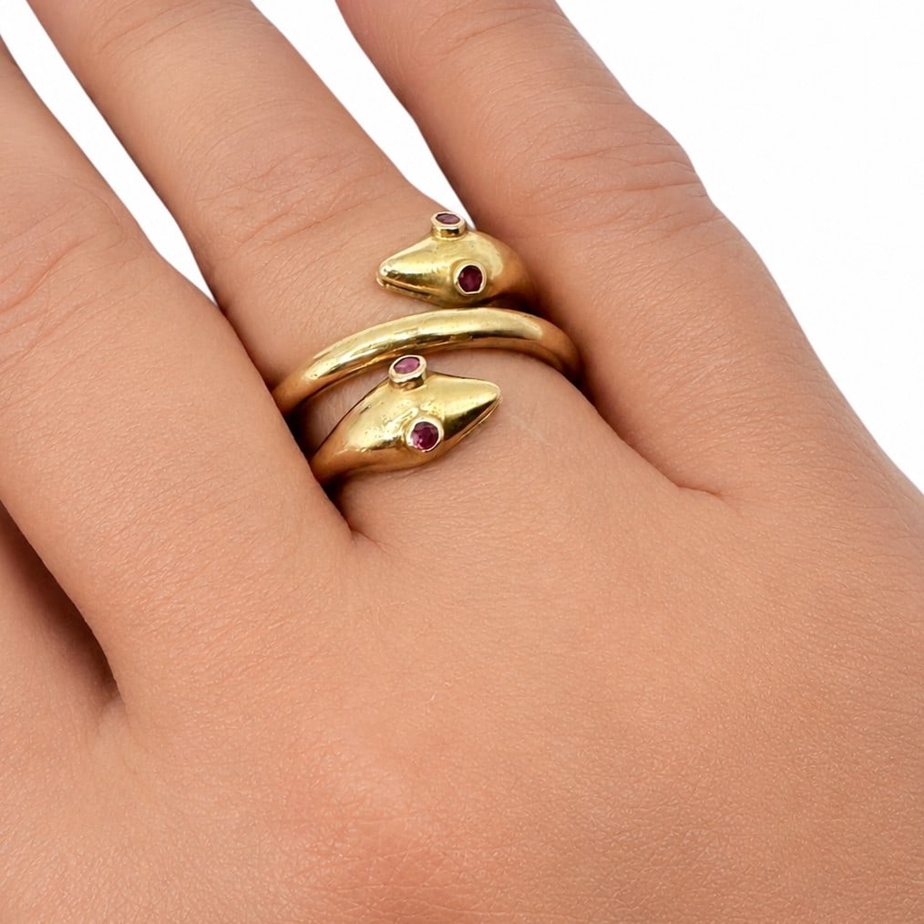 18K Gold and Ruby Two Headed Serpent Ring: 8.5 grams. Fits ring size 7 1/2 to 8. Please review photos for more details as they are a part of the description. Item is being sold as found from an estate collection and may show signs of age,
