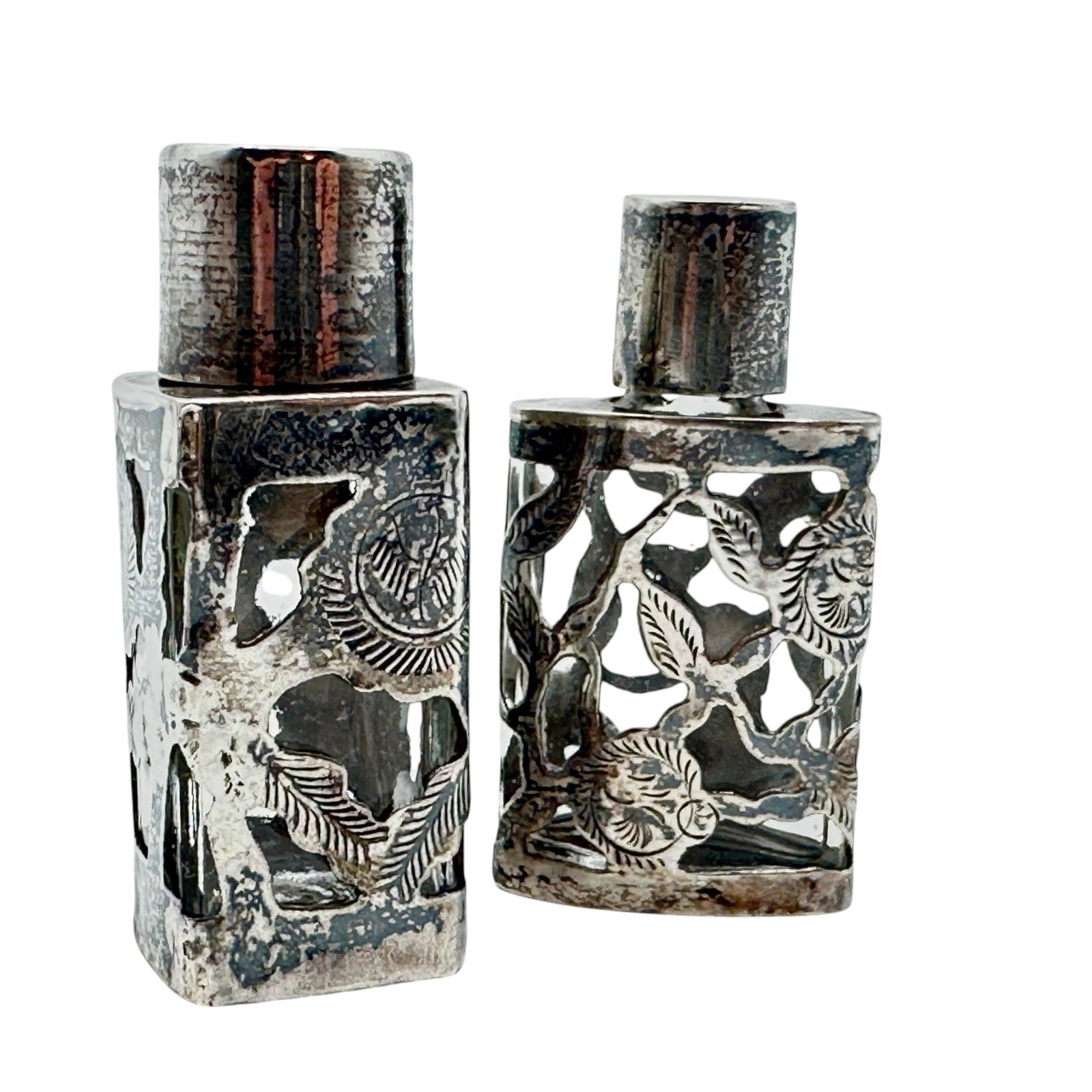 Pair of Mexican Sterling Silver over Glass Perfume Bottles: Please review photos for more details as they are a part of the description. Item is being sold as found from an estate collection and may show signs of age, use, wear, imperfections, or surface