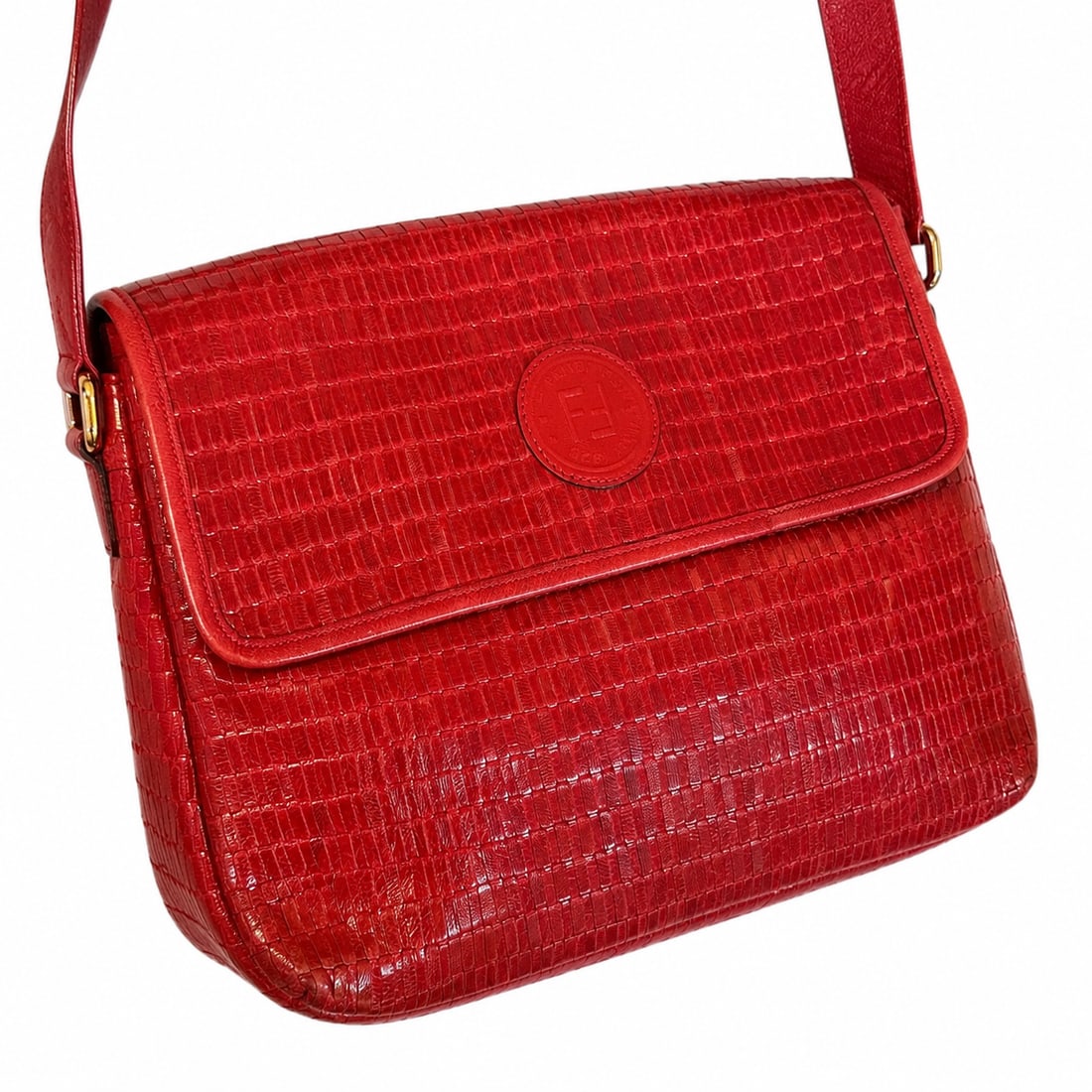 Vintage Fendi Red Woven Leather Bag: Measures 9"H x 10"W. Strap drops 17". Please review photos for more details as they are a part of the description. Item is being sold as found from an estate collection and may show signs of age,