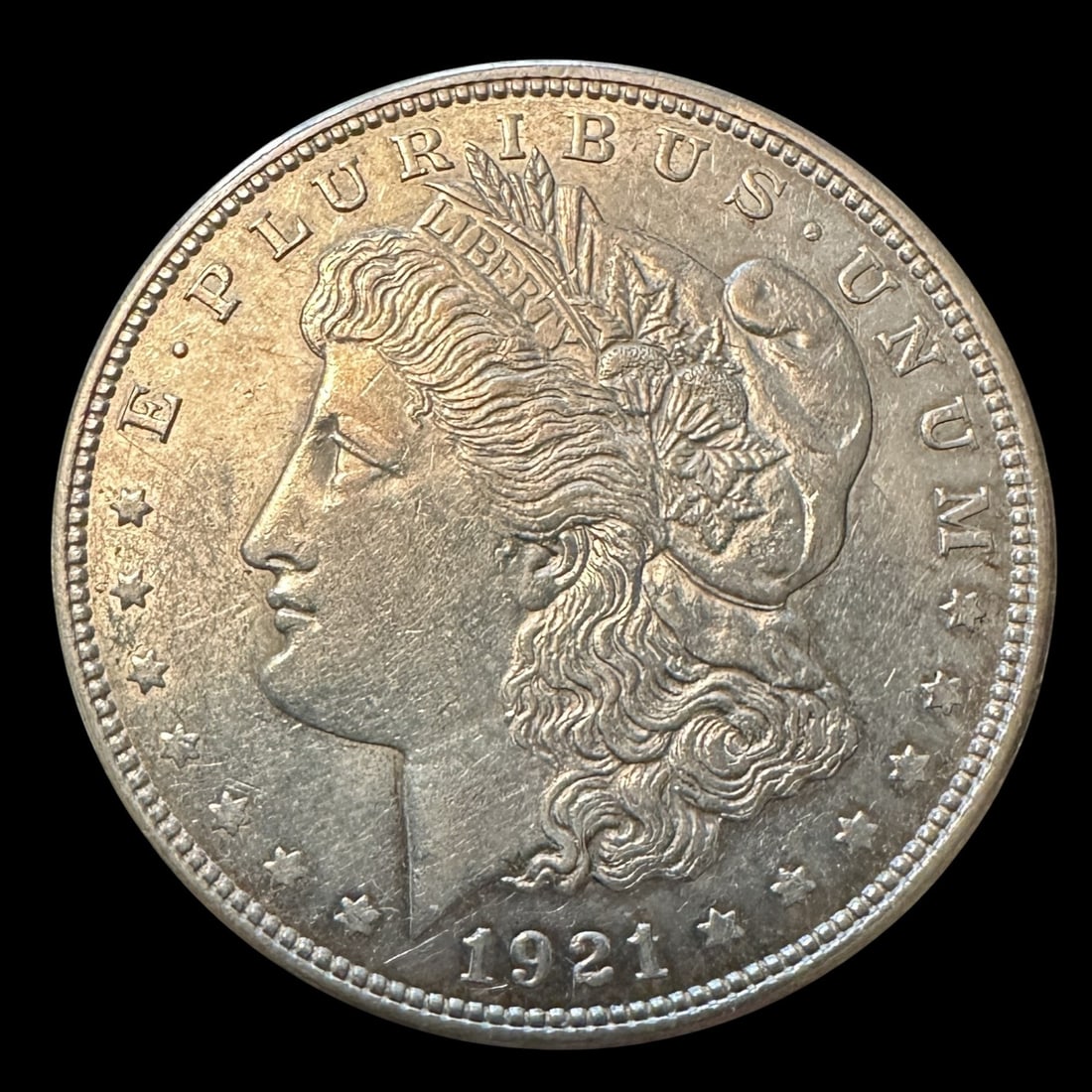 1921 Morgan Silver Dollar: Please review photos for more details as they are a part of the description. Item is being sold as found from an estate collection and may show signs of age, use, wear, imperfections, or surface