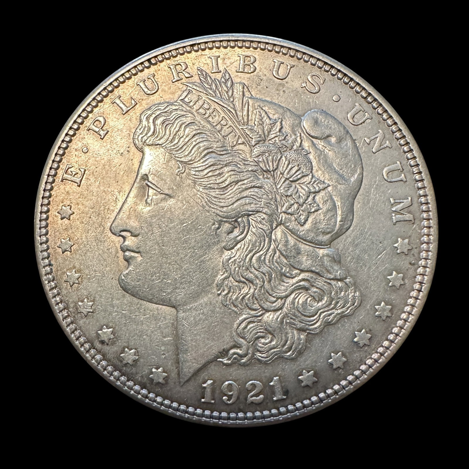 1921 Morgan Silver Dollar: Please review photos for more details as they are a part of the description. Item is being sold as found from an estate collection and may show signs of age, use, wear, imperfections, or surface