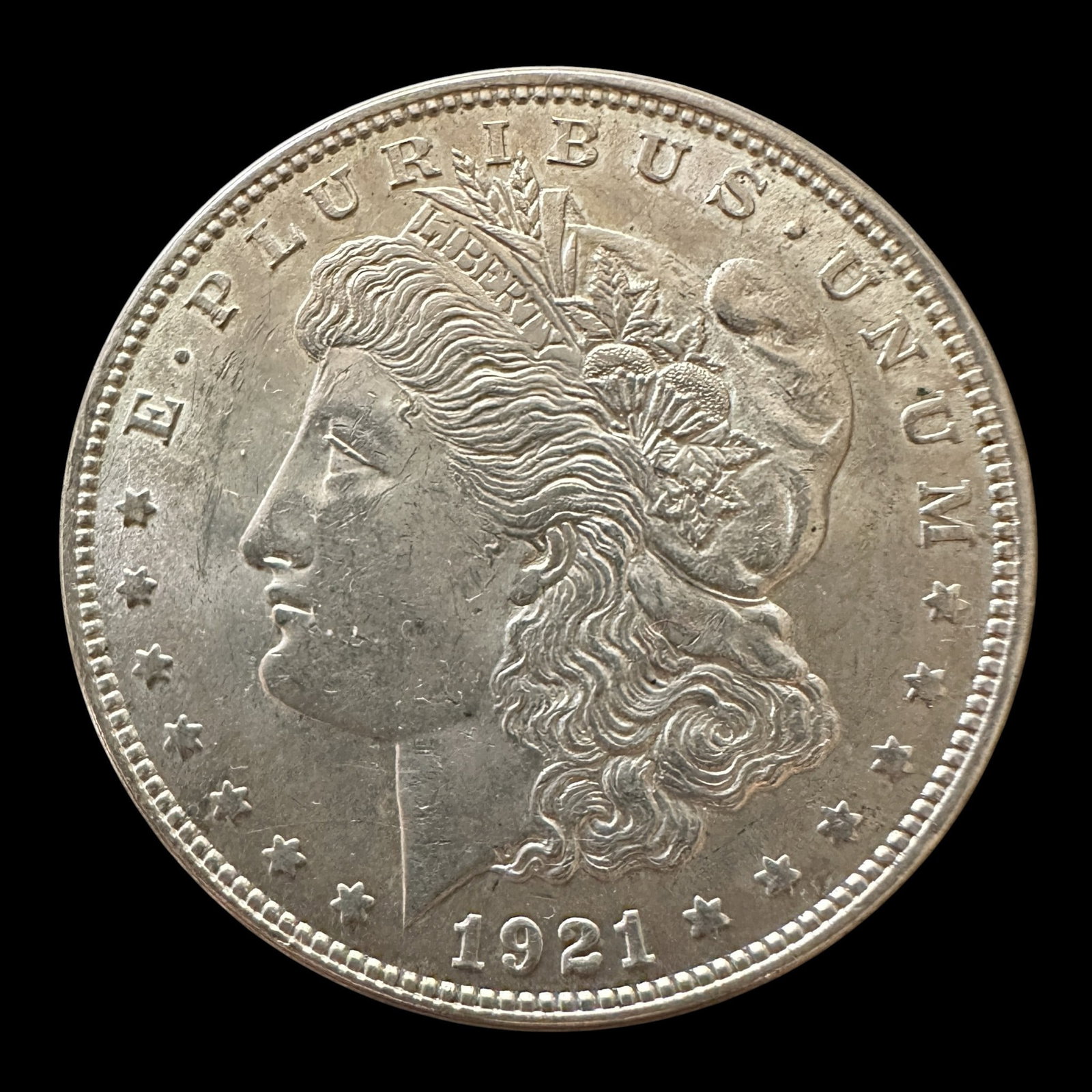 1921 Morgan Silver Dollar: Please review photos for more details as they are a part of the description. Item is being sold as found from an estate collection and may show signs of age, use, wear, imperfections, or surface