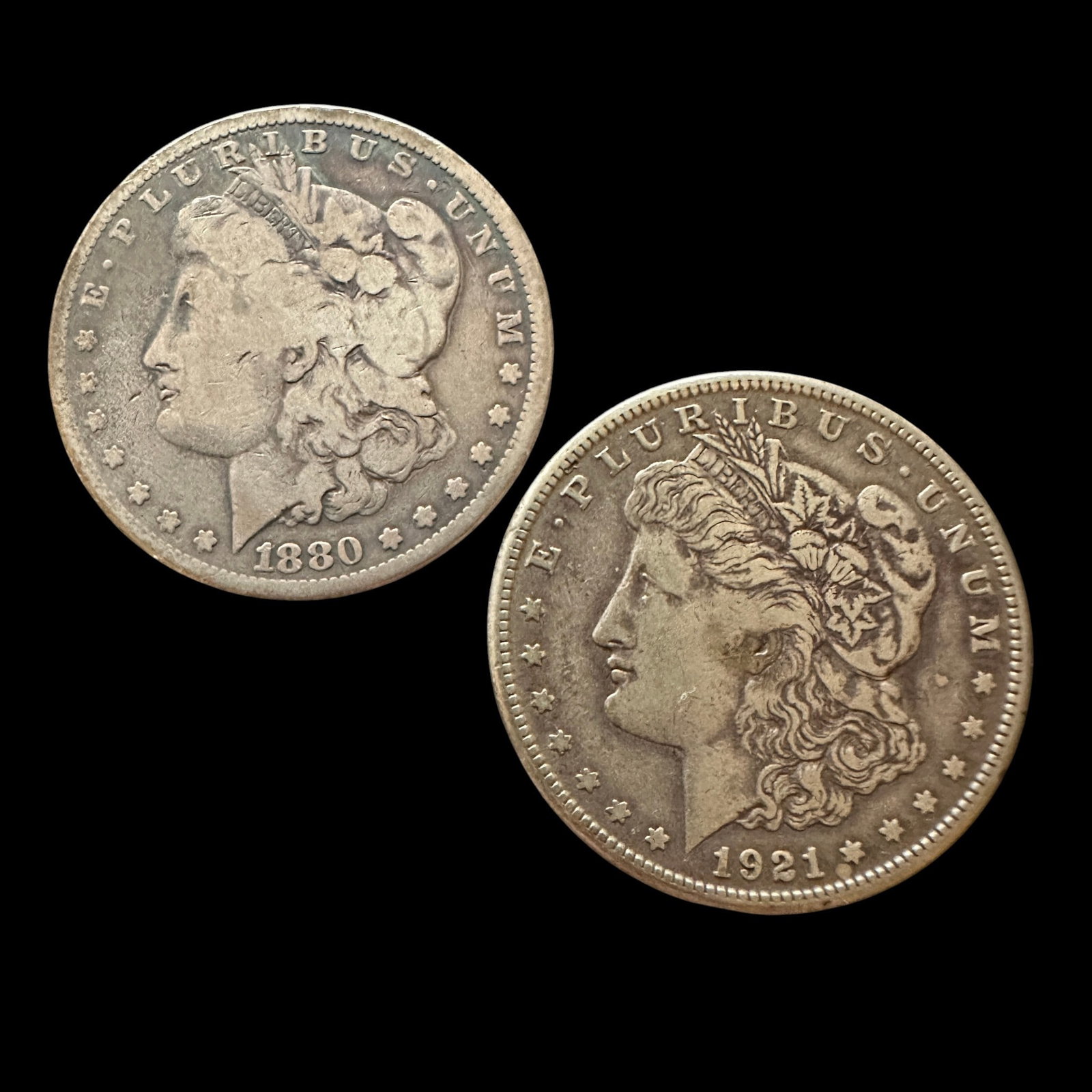 1880 and 1921 S Morgan Silver Dollars: Please review photos for more details as they are a part of the description. Item is being sold as found from an estate collection and may show signs of age, use, wear, imperfections, or surface