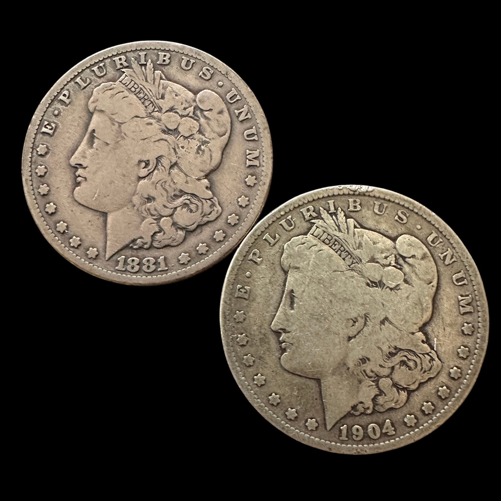 1881 S and 1904 O Morgan Silver Dollars: Please review photos for more details as they are a part of the description. Item is being sold as found from an estate collection and may show signs of age, use, wear, imperfections, or surface
