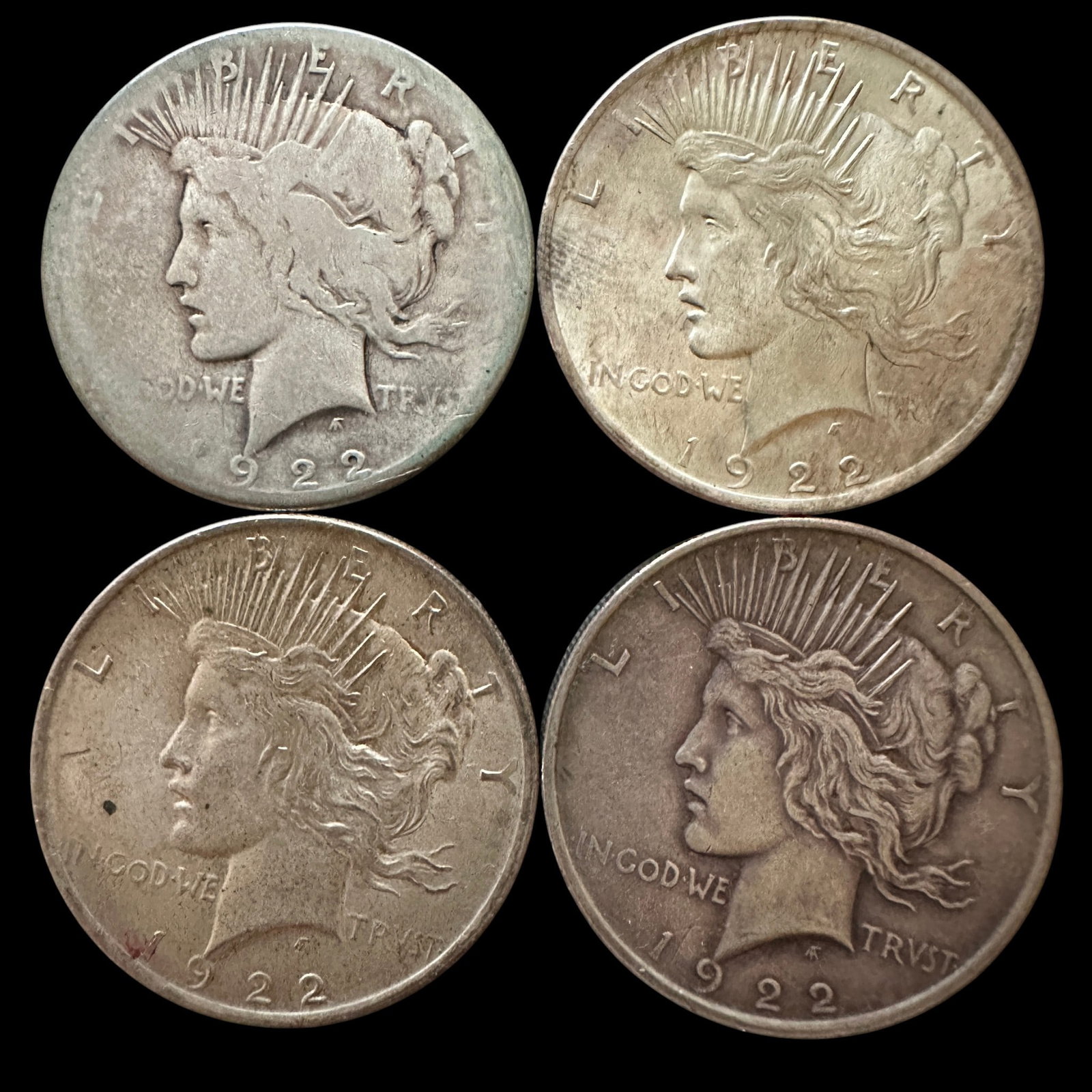 Four 1922 Peace Silver Dollars: Please review photos for more details as they are a part of the description. Item is being sold as found from an estate collection and may show signs of age, use, wear, imperfections, or surface