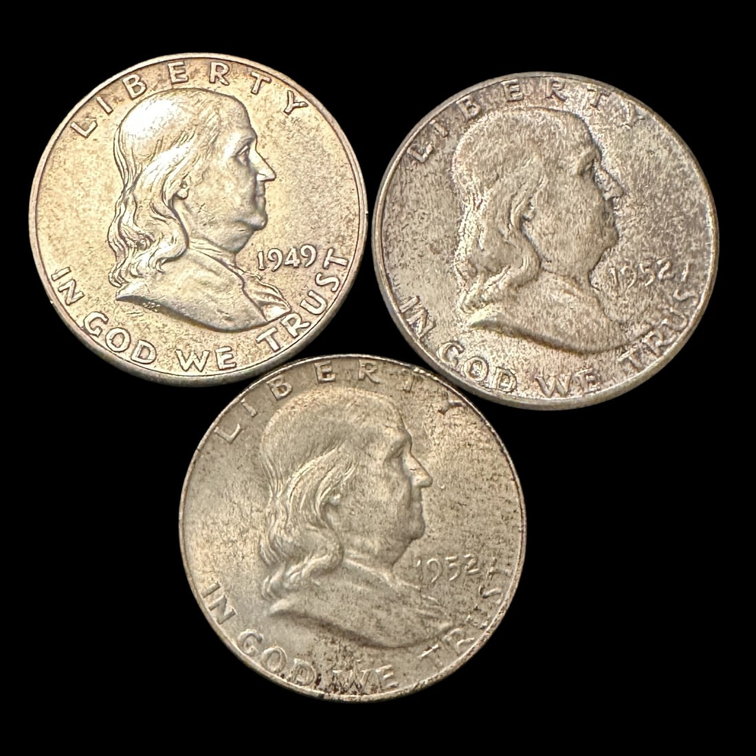Three Franklin Half Dollars 1949 S, 1952 and 1952 D: Please review photos for more details as they are a part of the description. Item is being sold as found from an estate collection and may show signs of age, use, wear, imperfections, or surface