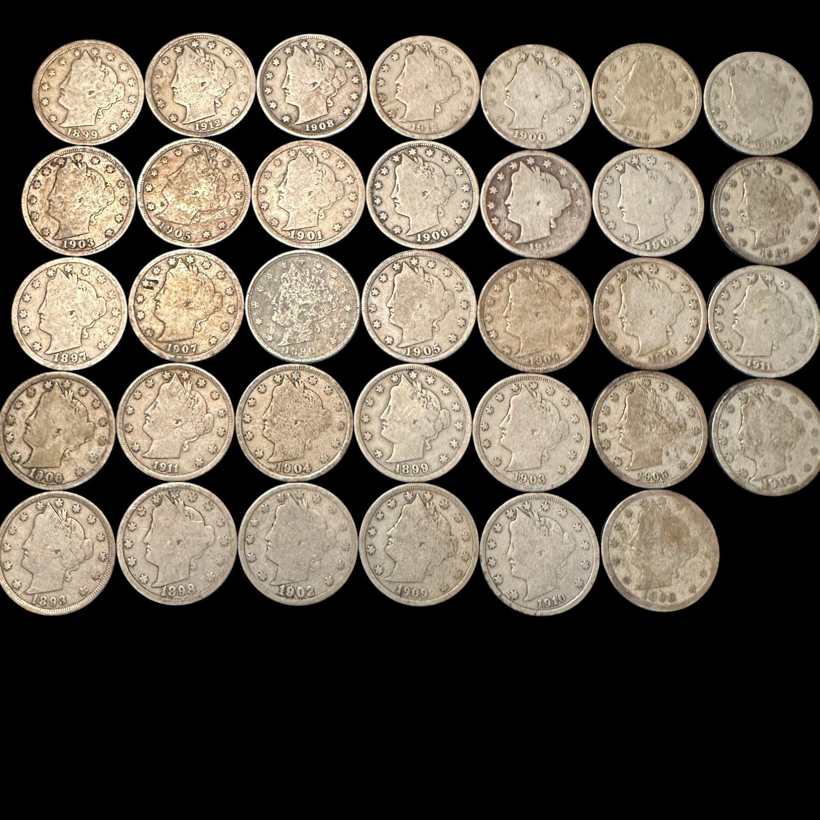 34 Liberty Head V-Nickels: Please review photos for more details as they are a part of the description. Item is being sold as found from an estate collection and may show signs of age, use, wear, imperfections, or surface varia