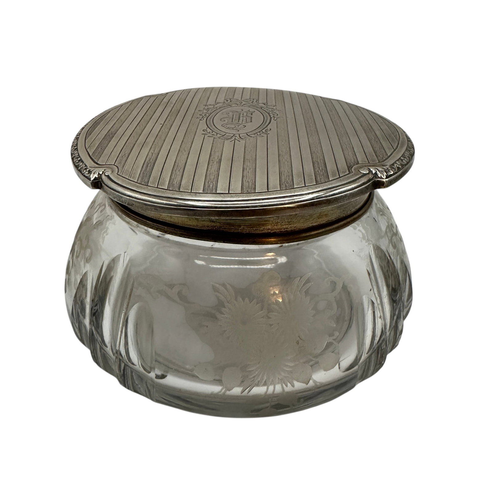 Vintage Cut Crystal Powder Jar with Sterling Silver Top: Top appears to be lopsided but fits securely on the jar. Total weight of sterling top is 69 grams. Jar measures 3" tall by 4" in diameter at the widest point. Please review photos for more details as 