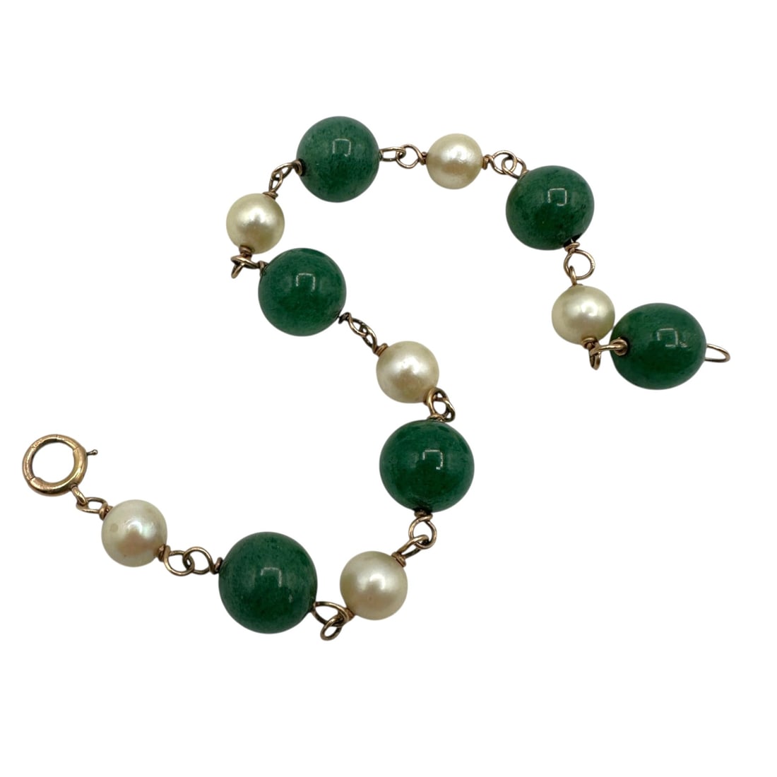 14K Gold Pearl and Jade Bracelet: Measures 7 1/2" long. Please review photos for more details as they are a part of the description. Item is being sold as found from an estate collection and may show signs of age, use, wear,