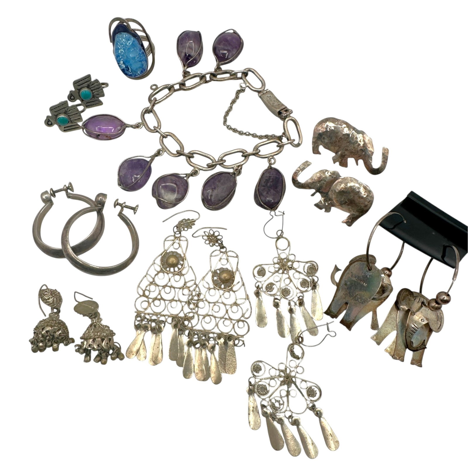 Lot of Vintage Mostly Sterling Silver Jewelry: Note that amethyst bracelet is missing one stone. Please review photos for more details as they are a part of the description. Item is being sold as found from an estate collection and may show signs 