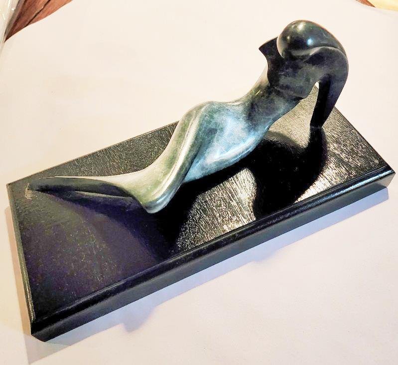 Haim Azuz Elegant Bronze Sculpture of Reclining Nude on Black Marble Base: Haim Azuz Elegant Bronze Sculpture of Reclining Nude on Black Marble Base... Haim Azuz is a celebrated Israeli Postwar & Contemporary artist who was born in 1932. Haim Azuz's work has been offered at 