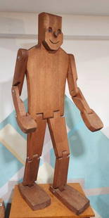 Large Vintage Wood Articulated Man Statue Sculpture by Don Ellefson, Circa 1980s: Don Ellefson is an American artist who created a variety of wooden sculptures. Known as the Corky sculpture, this piece is made of solid oak wood, movable pieces that can be adjusted to the position y