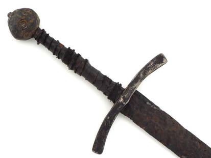 Excavated Medieval English or Italian Crusader Knight Sword with Sculptured Hilt Mounts and Leather: Excavated Medieval English or Italian Crusader Knight Sword with Sculptured Hilt Mounts and Leather Grip Wrapping for a Museum Display. Blade is Circa 9th-12th Century. Full Length 40 inch Blade Lengt