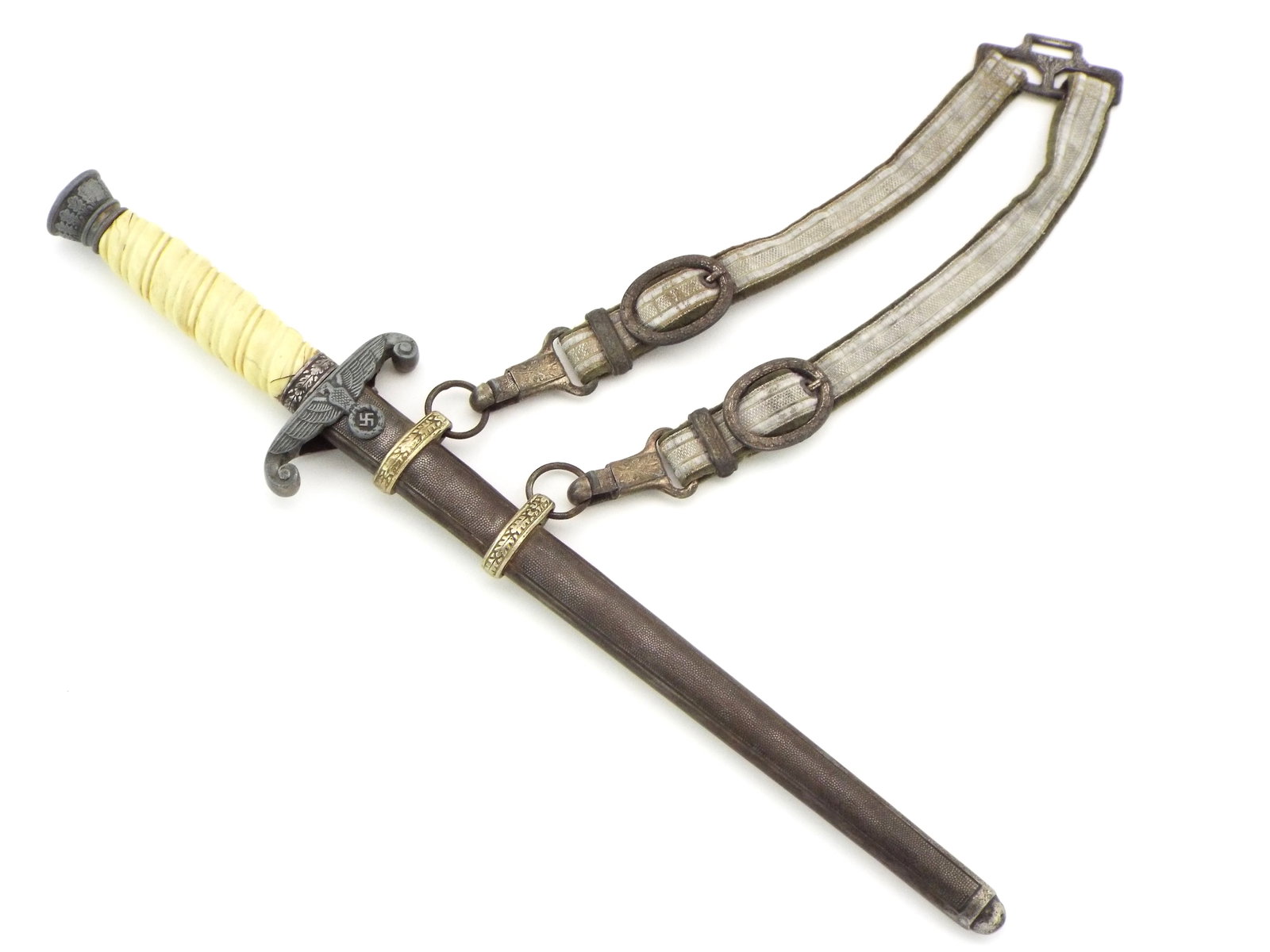 German WWII Personalized Army Officer Dagger With Hangers: German WWII Personalized Army Officer Dagger with Hangers. The reverse of the crossguard is lightly personalized Unmarked blade is bright Full Length 16 Inch Blade Length 10 Inch