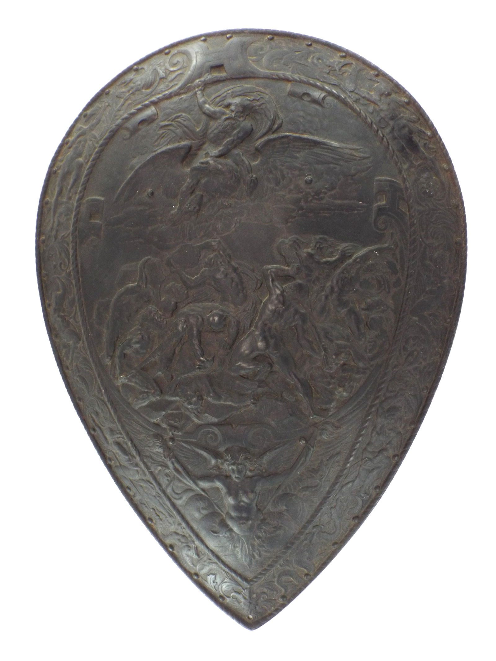 Excellent 16th C. French Embossed Shield: Antique French parade armor iron shield, in the style of Henry II, embossed with a elaborate mythological scene with nude figures, and further figural embellishments around the tear drop form.