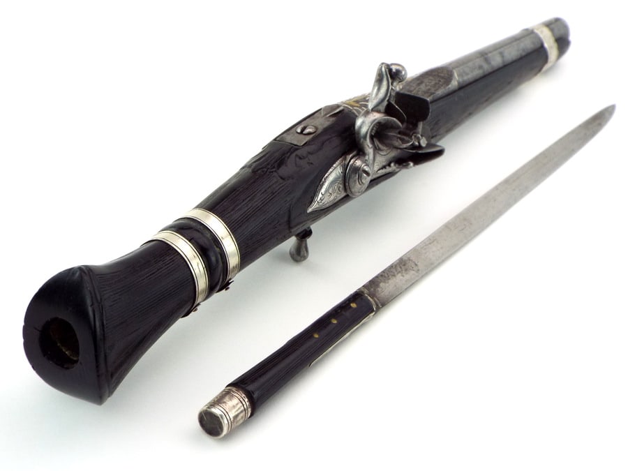 Incredibly RARE and Fine Greek Pistol with Concealed Dagger within a Butt. Silver Mounts. Ribbed: Incredibly RARE and Fine Greek Pistol with Concealed Dagger within a Butt. Silver Mounts. Ribbed Ebony Stock. From Herb Ratner CollectionFull Length 15.5