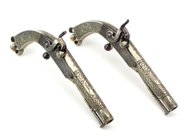 Spectacular matching pair of Scottish all steel and German silver .