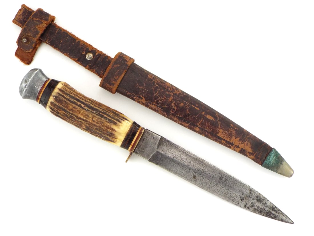 Solingen German hunting knife converted into a fighting knife.: Solingen German hunting knife converted into a fighting knife. the ricasso is stamped, York Cutlery Co. Southern Germany on one side and Solingen on the other.Full Length 10.5 Blade Length 5.5