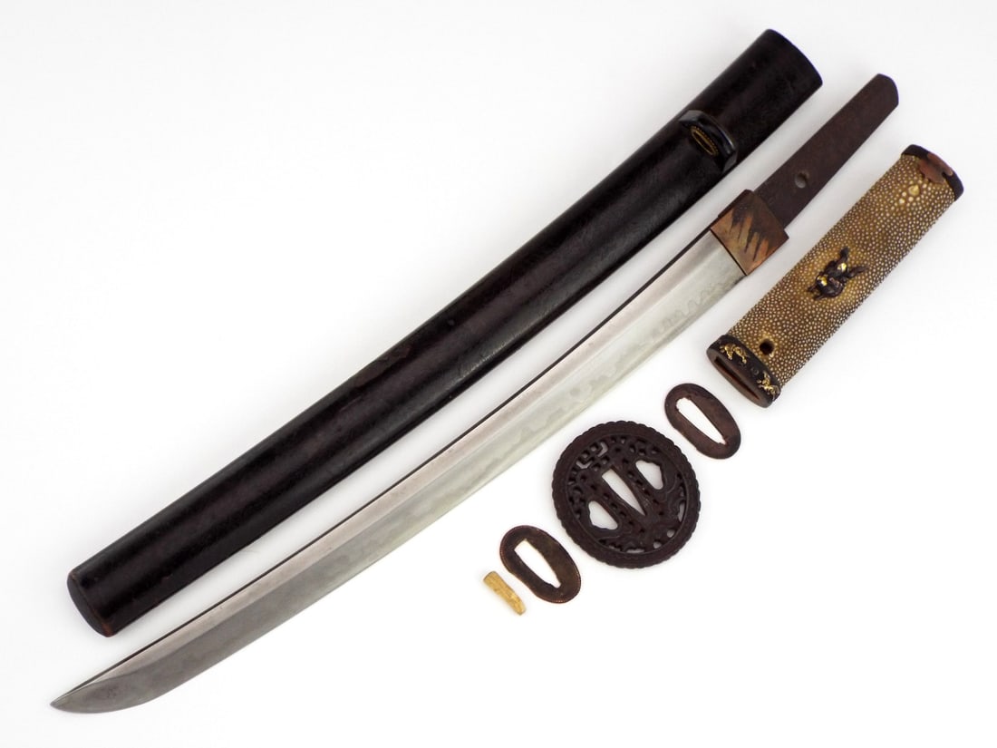 Japanese Edo Period Samurai Wakizushi Signed Sukenaga: Here is an 19th century wakizashi signed with a signature attributing it to a Bizen Sukenaga who worked between 1830 an 1854. This is 13.5 blade is out of polish yet the well made.Temper is boldly vis