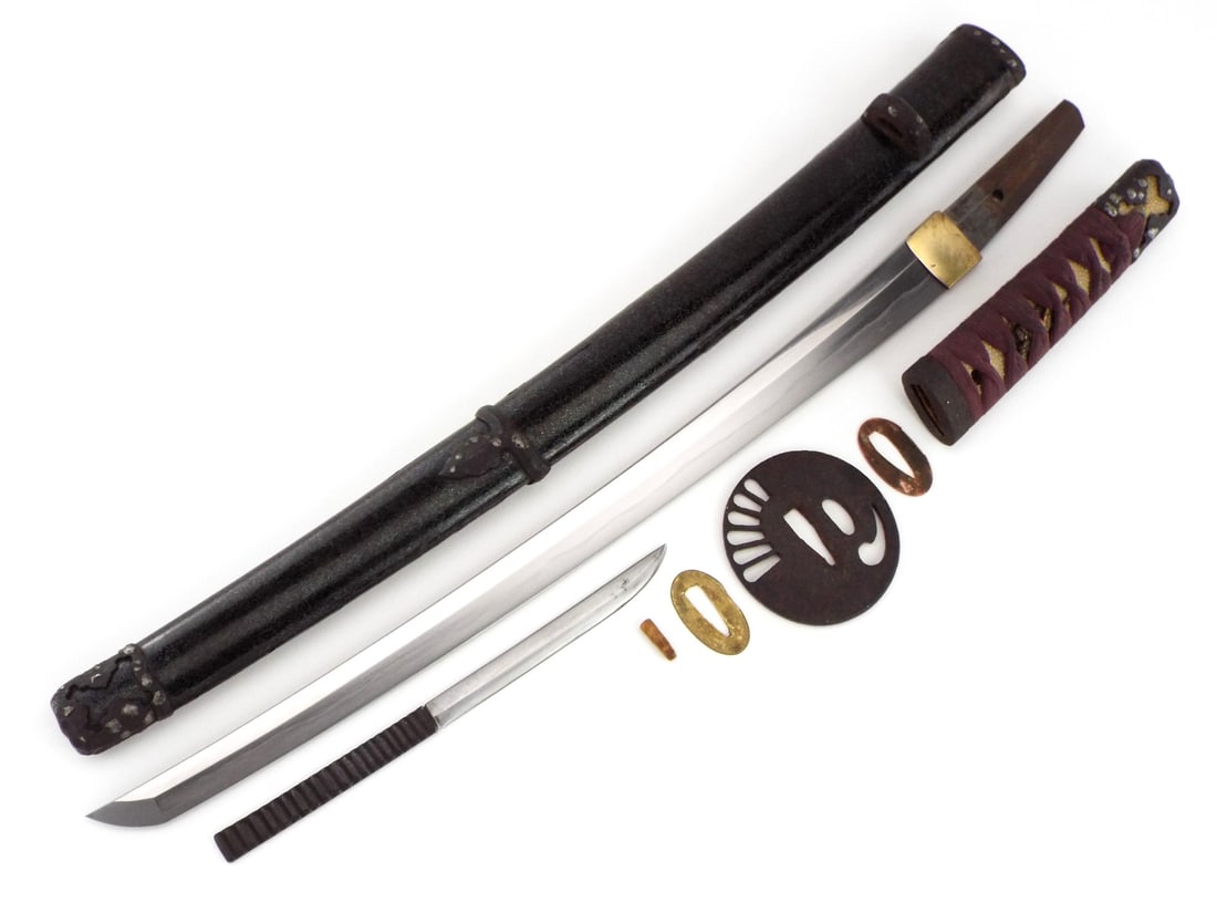 Japanese Quality Made Hand Forged Wakizashi Sword: It has a true water temper with a surprisingly sharp edge and is traditionally polished and sharpened. Full Length 25.5 inch Blade Length 17 inch