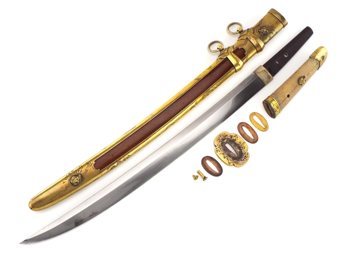 Impressive Japanese KOTO Fully Brass Mounted TACHI Ko-dachi Samurai Sword: This outstanding sword is fully mounted, in its entirety, with rarely encountered heavy brass mounts that encase a copper brown lacquered wood scabbard. The fittings being heavily hand chased with wis