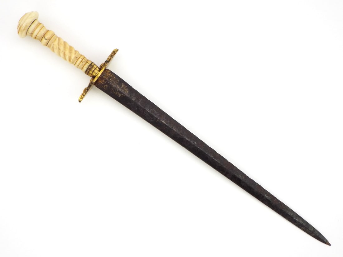 English 19 century Naval officer’s dirk, Napoleonic Wars era,etched blade with traces of gilt: English 19 century Naval officer’s dirk, Napoleonic Wars era,etched blade withtraces of gilt decorations, carved bone hilt with circular pommel and hilt crossguard, circa 1820 Full Length 12 Inches