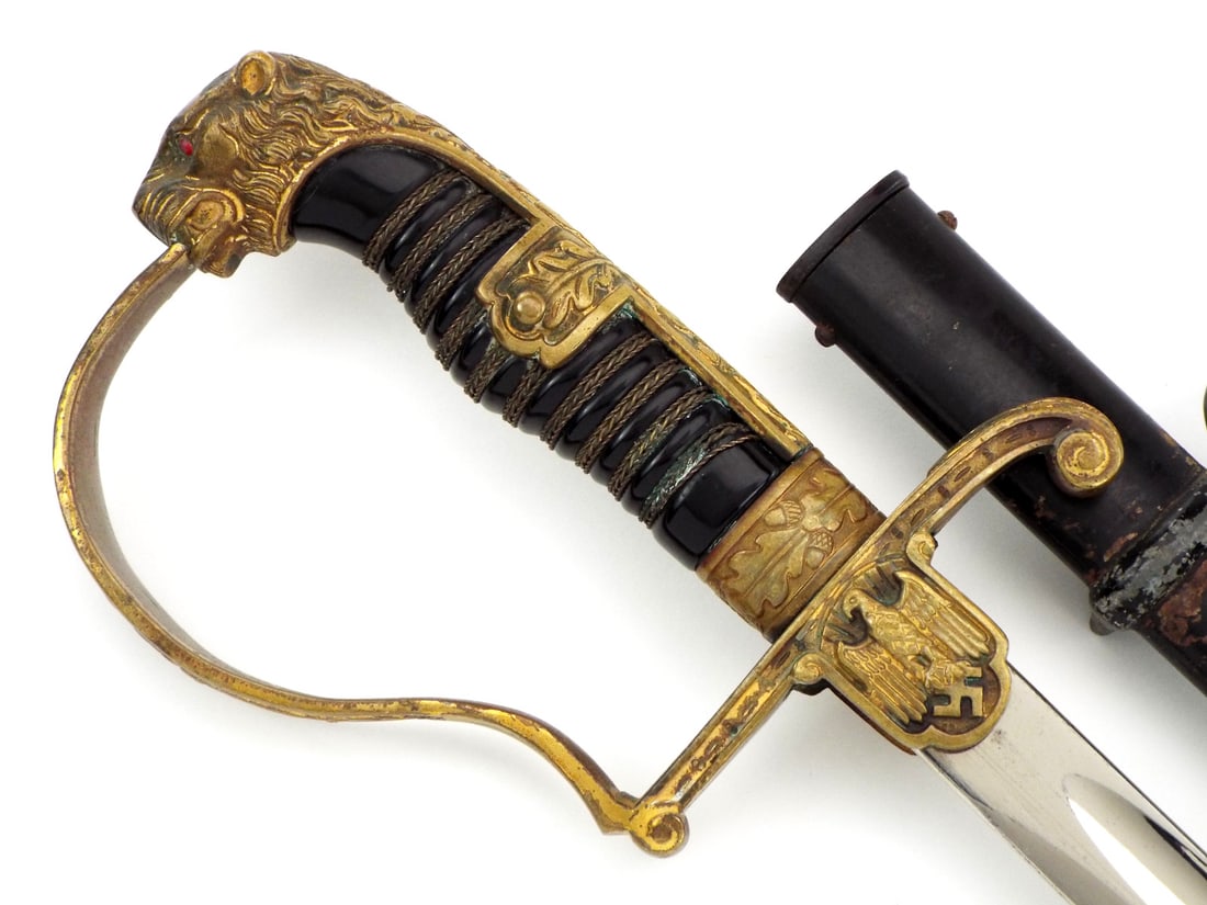 German WWII Officers Panther Head Sword by Carl Eickhorn of Solingen: German WWII Officers Panther Head Sword by Carl Eickhorn of Solingen. Full Length 37 Inches. Blade Length 31.5 Inches.