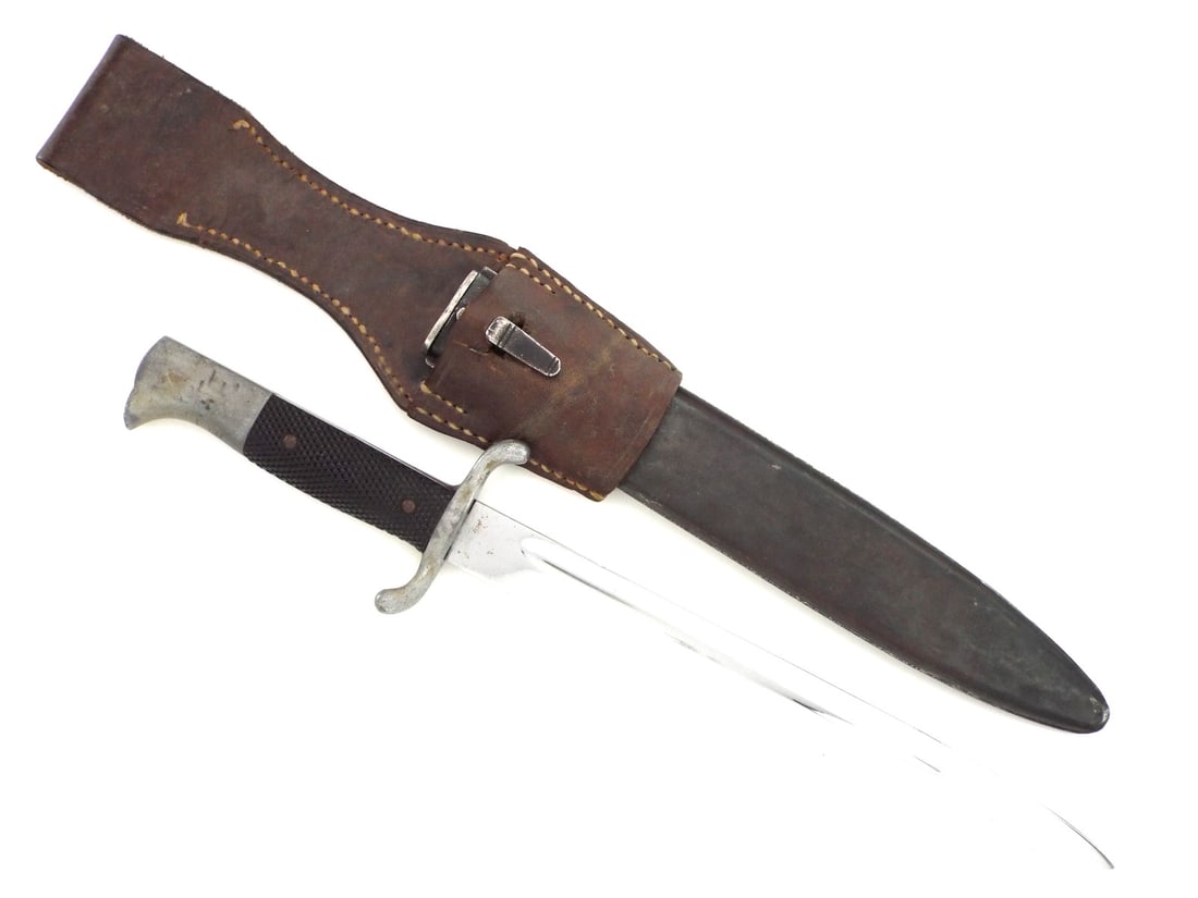 Interesting German WWII Battle Bayonet with Leather Frog: Interesting German WWII Battle Bayonet with Leather Frog. Full Length 16 Inches Blade Length 10 Inches