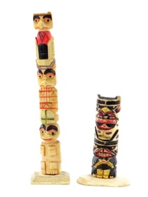 Pair of Hand-Carved Totem Pole Figurines with Traditional Native American Designs