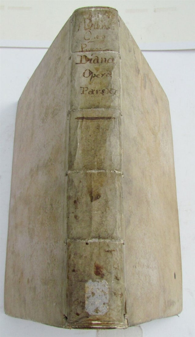 1678 VELLUM BOUND ANTIQUE FOLIO Antonini Diana Panormitani Resolutiones Morales: Antonini Diana Panormitani… Resolutiones Morales. Venice, 1678. Size 13 x 9.5". Folio. Period vellum, title to spine in manuscript. Some toning on the pages. Ex-library. (23).