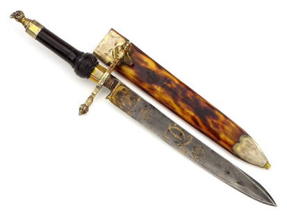 Antique Austrian Nobleman's Hunting Dagger in Plug bayonet-style: Plug bayonet-style hilt with crossguard ending in ram's heads and pommel en suite. Smooth horn grip. Blade engraved with Austrian eagle and two Royal monograms. Scabbard of tortoise shell with matchin