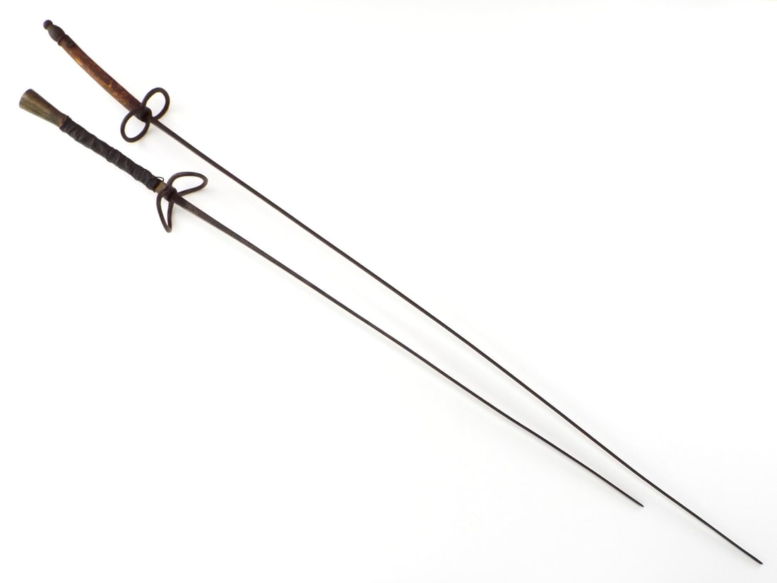 Pair 19th Century German Fencing Foils NY and Boston Retailer Marked: Pair 19th Century German Fencing Foils NY and Boston Retailer Marked. 1st Full Length 31 Inches Blade Length 23 Inches 2nd Full Length 39 Inches Blade Length 31.5 Inches