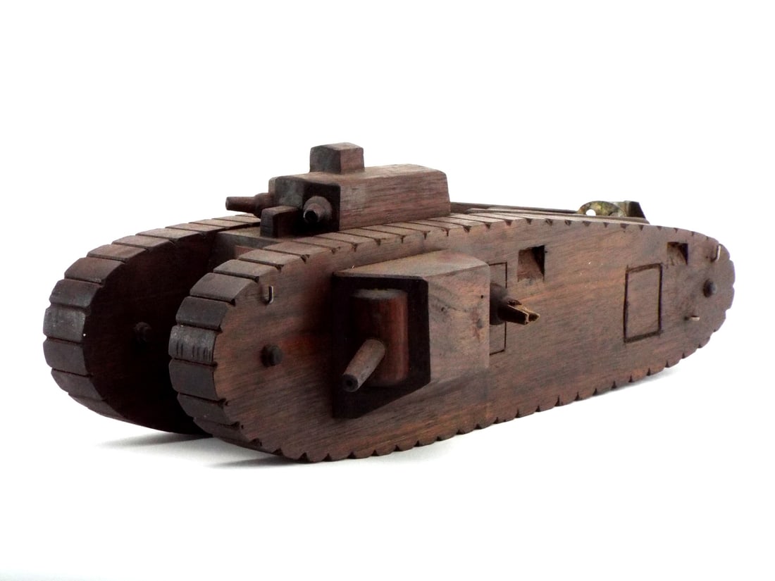 WWI Era Armored Tank Patent Model: A large, rare and interesting World War I era model tank reportedly used for tank development just after World War I. Scratch made from wood showing intracite detail throughout. Has painted inventory 