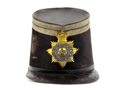 I'D Crimean War Royal Cumberland Shako: A very nice identified British Crimean war era military shako identified to a Colonel in the Royal Cumberland Militia dated 1855. Overall very nice condition for its age with a beautiful front badge,