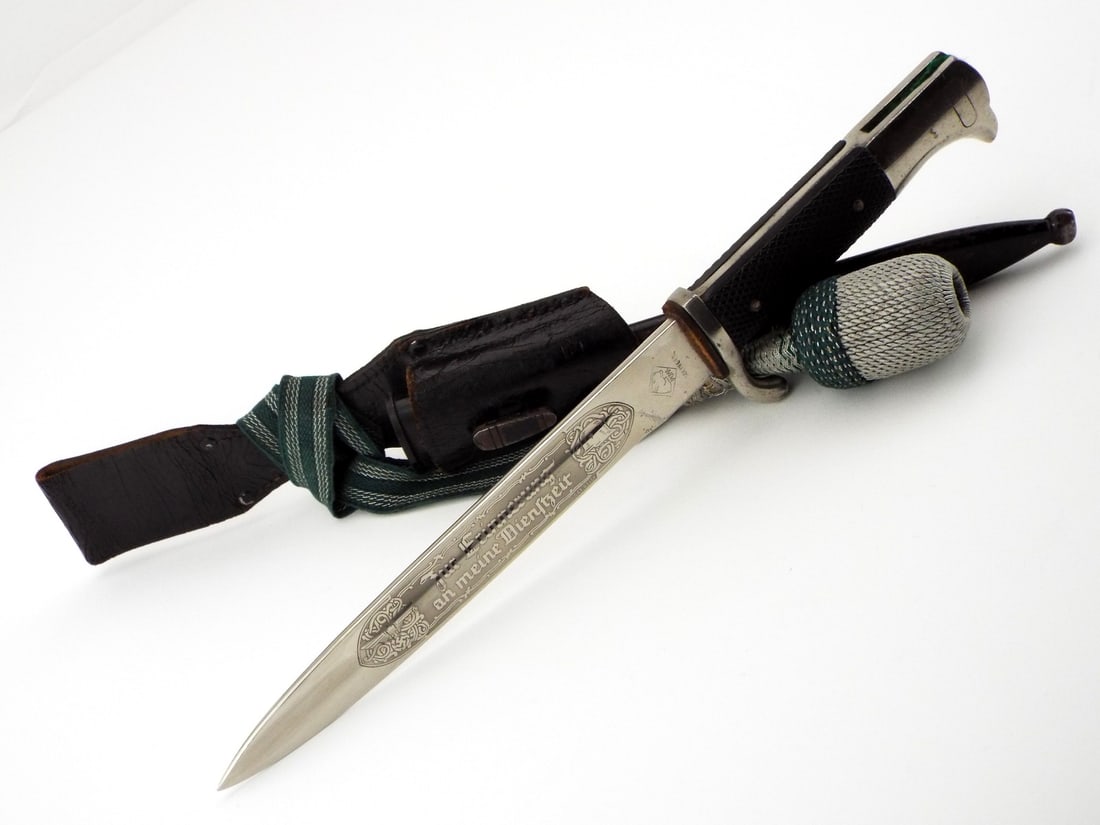 Exceptional German WWII Engraved Dress Bayonet by PUMA SOLINGEN with Knot and Frog: Exceptional German WWII Engraved Dress Bayonet by PUMA SOLINGEN with Knot and Frog, mint blade with deep engraving. Full Length 14 Inches Blade Length 7.5 Inches