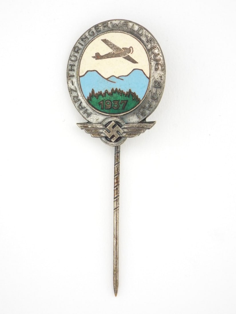 RARE German WWII Flight Competition 1937 Enamel Stick Pin: Collectors know the difficulty of locating original examples of early, enameled examples of Nazi flight related regalia. Offered here is what's considered a rare enamel lapel device commemorating a 19