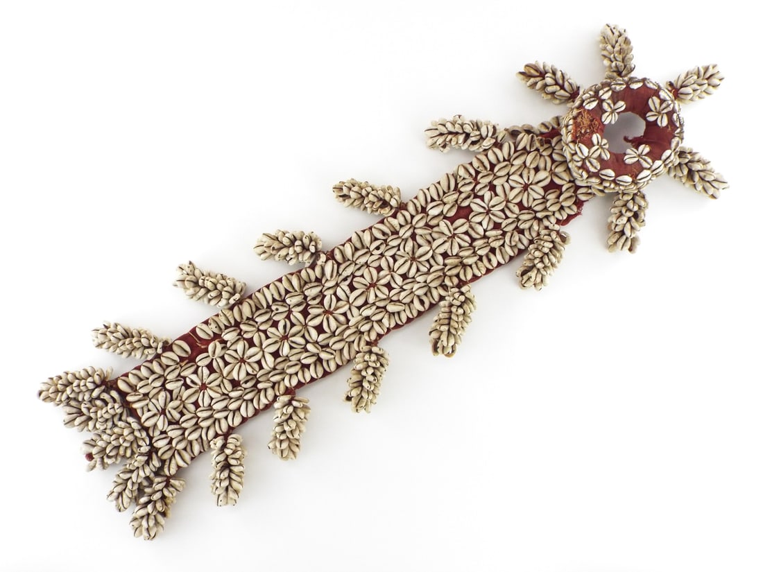 Antique Indian Rajastan Cowrie Shells Womens Pot Holder: Used by Indian women to balance a pot of water on the top of their head to transport it.The cowrie shell is a sign of femininity and fertility, so it may have been created for a wedding.
