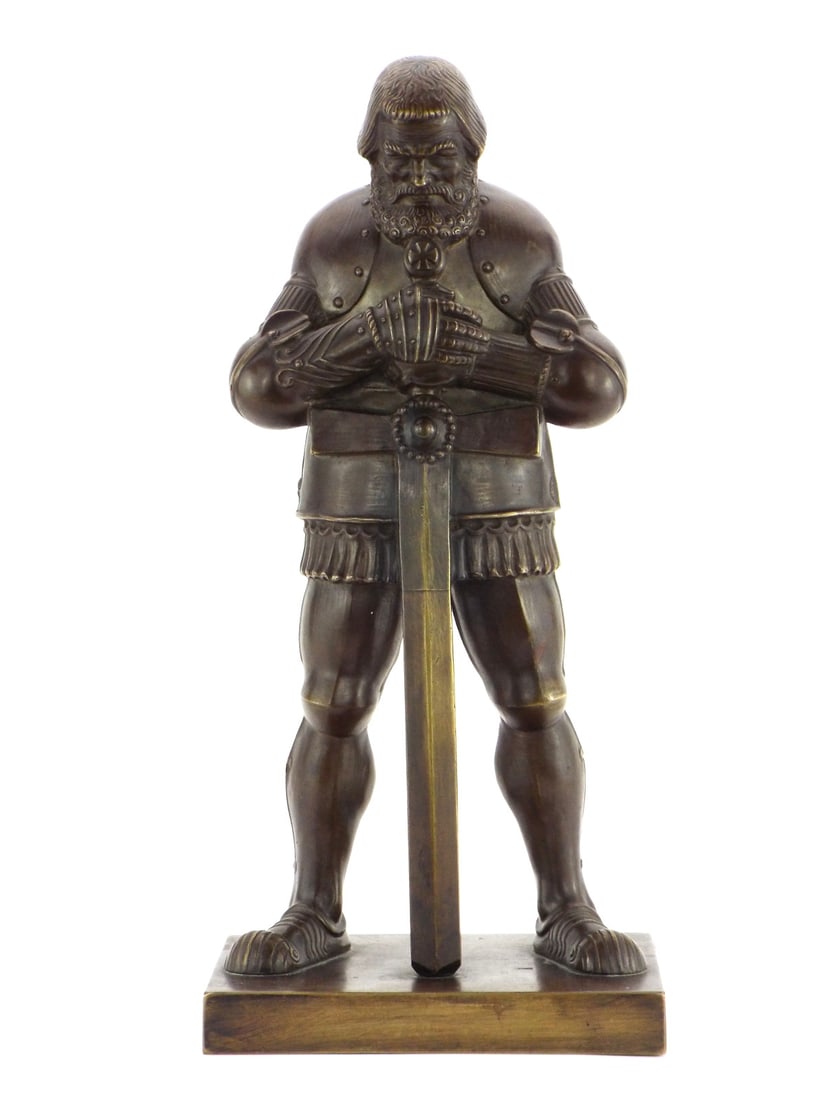 Massive Bronze Sculpture of an Imperial or Third Reich Era Germanic Knight: 4.5 x 6 x 13 Inches. This is a heavy, very high quality bronze sculpture of a very solemn looking Germanic knight. With head bowed he appears to be in either deep thought or prayer, with both hands cr