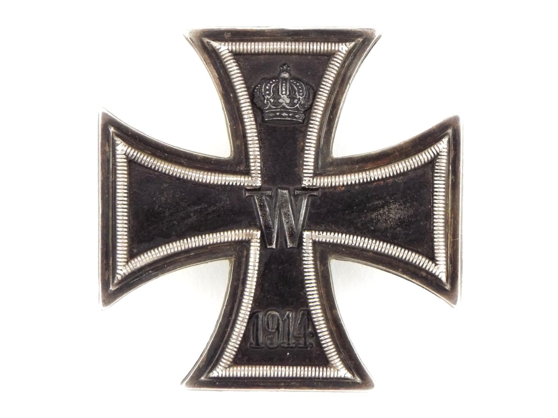 German WWI Maker Marked WS 1914 Iron Cross First Class: Well made, full size, real silver framed, German WW I, 1914 Iron Cross 1st class complete with an incused maker mark of WS located just to the bottom right of the pins C catch. Cross is in excellent c
